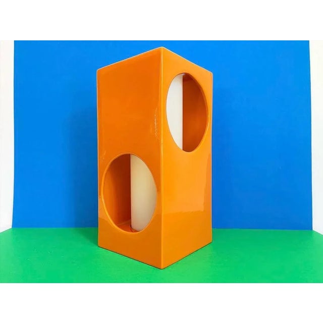Stunning sculptural mid-century modern geometric accent lamp featuring a saturated tangerine glazed ceramic upright...
