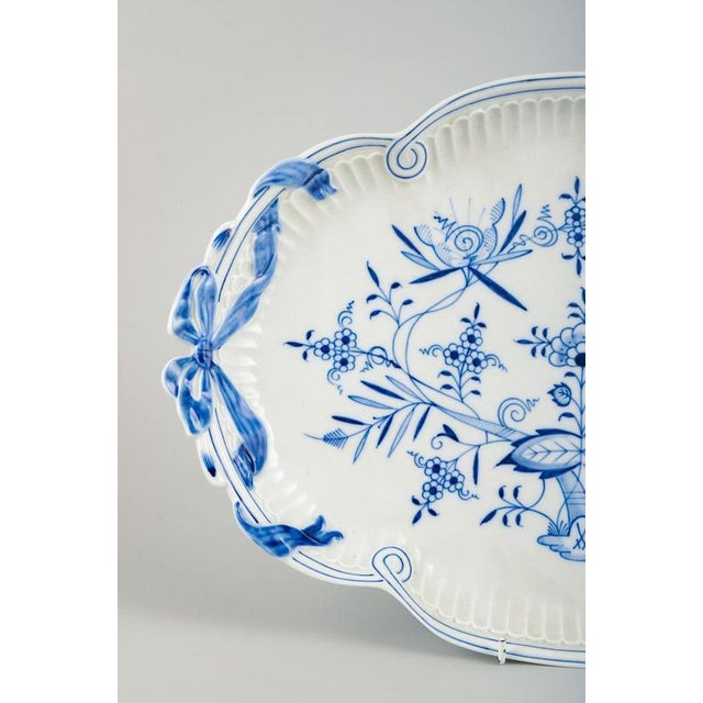 Meissen “Blue Onion” large platter. Meissen porcelain platter with openwork border and ribbon handles, decorated in...