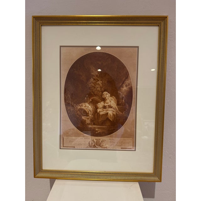 A beautifully composed antique engraving after Jean-Honoré Fragonard, titled La Bonne Mère (The Good Mother), rendered in...