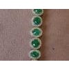 This is a stunning natural Zambian Emerald bracelet which has Emerald of very high quality and diamonds of very good...