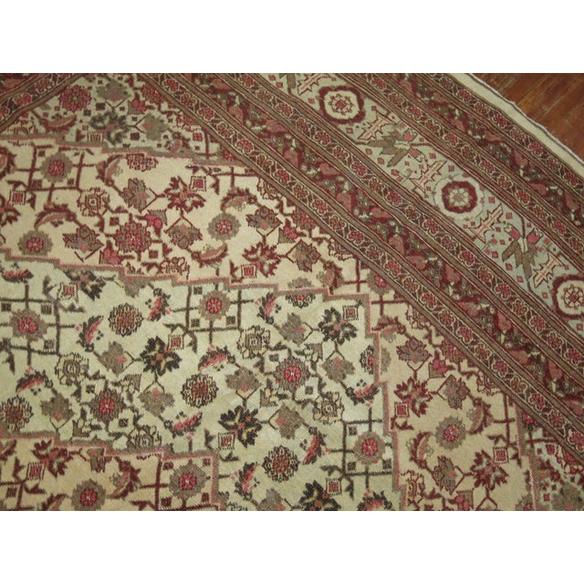 Enchanting room size Persian Tabriz carpet with repetitive Mahi fish Herati motif. The inner field is pistachio green,...