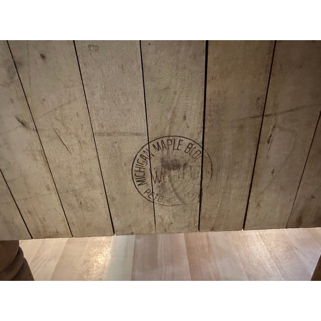 An exceptional vintage American butcher block table by the Michigan Maple Block Company of Petoskey, Michigan, featuring...