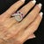 This is part of Chairish’s Fine Jewelry assortment. Estate ruby and diamond 18KW wide ring. This 18 karat white gold ring...