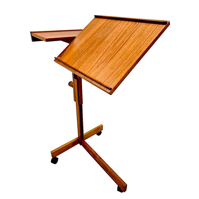 Offered is a Danish Teak wood side table/lectern/music stand by Furbo Spottrup. It features wheels for easy mobility and...