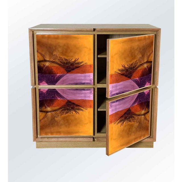 "Disegno Dieci" sideboard, 2026, by Meccani Studio for Meccani Design. A beautiful oak sideboard with cherry and walnut...