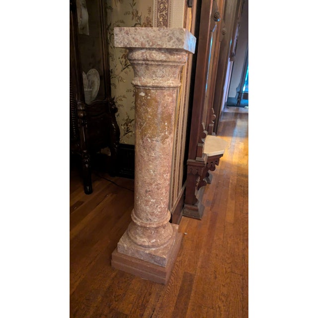 Offered here is a pair of Italian solid pink marble column pedestals, they are 10" x 10" x 40" high, they are each made in...