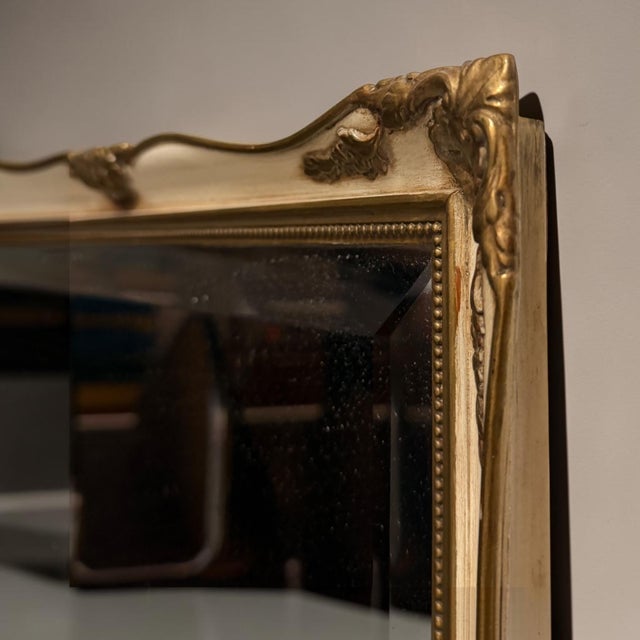 Elegant danish wall mirror produced by henrik nielsen & søn, denmark, c. 1940s–1950s. executed with a painted wooden frame...