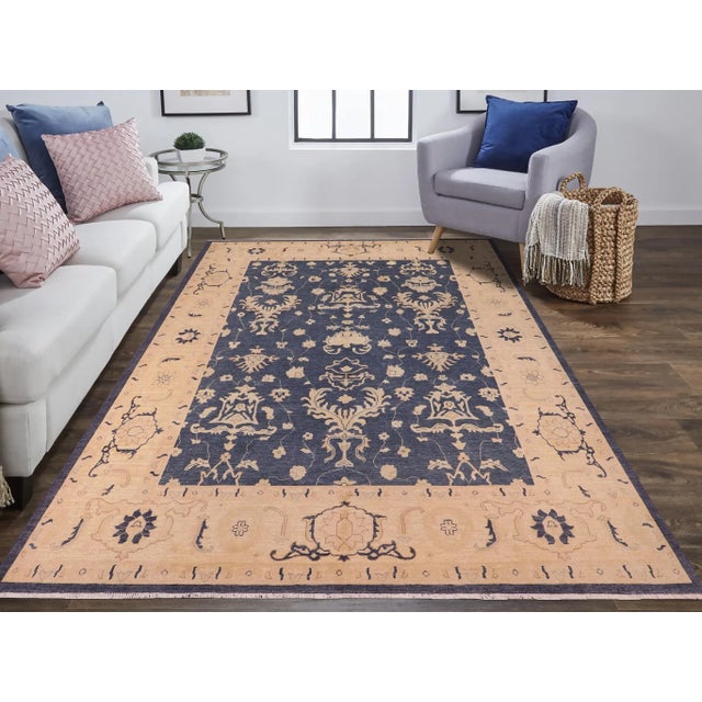 "Enhance the ambiance of your home with this magnificent Persian-influenced Turkish hand-knotted rug made by skilled...