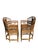 These chairs feature gracefully arched backs with pagoda-style silhouettes, accented by finely spaced vertical spindles...