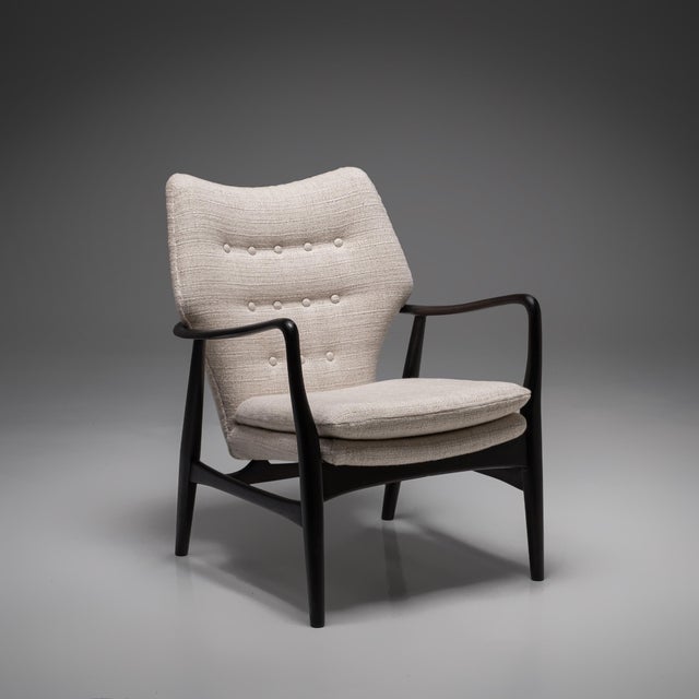 The iconic ms-6 lounge chair by arnold madsen and henry schubell is a refined example of danish craftsmanship and...