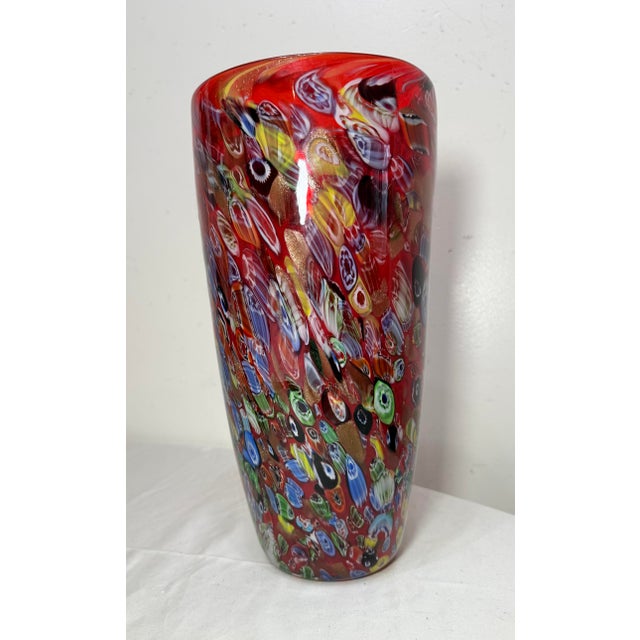 This vintage Italian Murano hand blown millefiori glass vase is a stunning piece of mid-century modern art glass. With its...