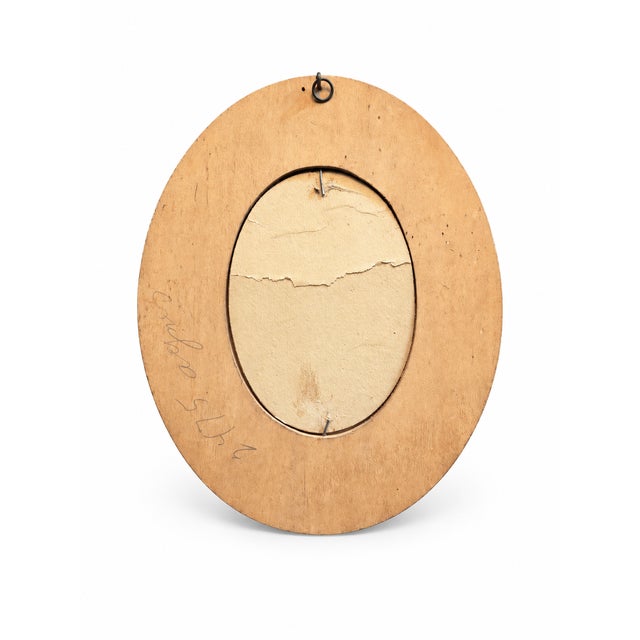 This is an authentic antique oval picture frame featuring beautiful, hand-executed pyrography (traditional wood-burning...