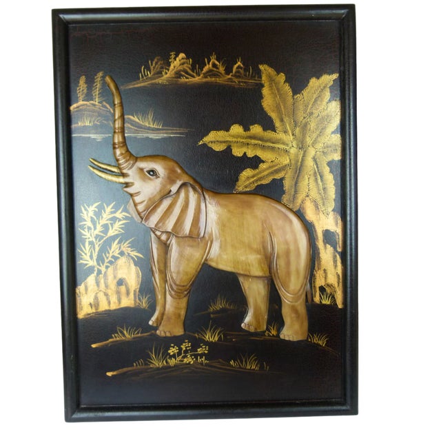 A Pair of Vintage Lacquer Elephant Art – Black & Gold Tropical Scene in a Black Wood Frame This striking vintage wall art...