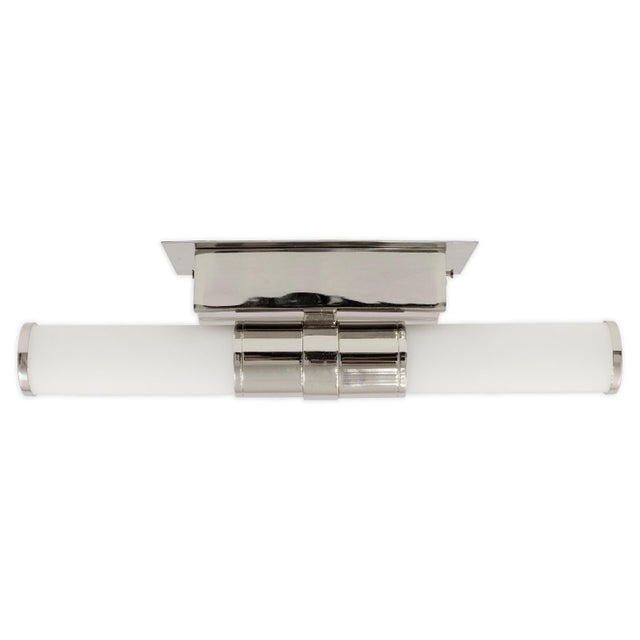 This pair of Robert Abbey Roderick wall sconces brings a clean, contemporary presence with their streamlined cylindrical...