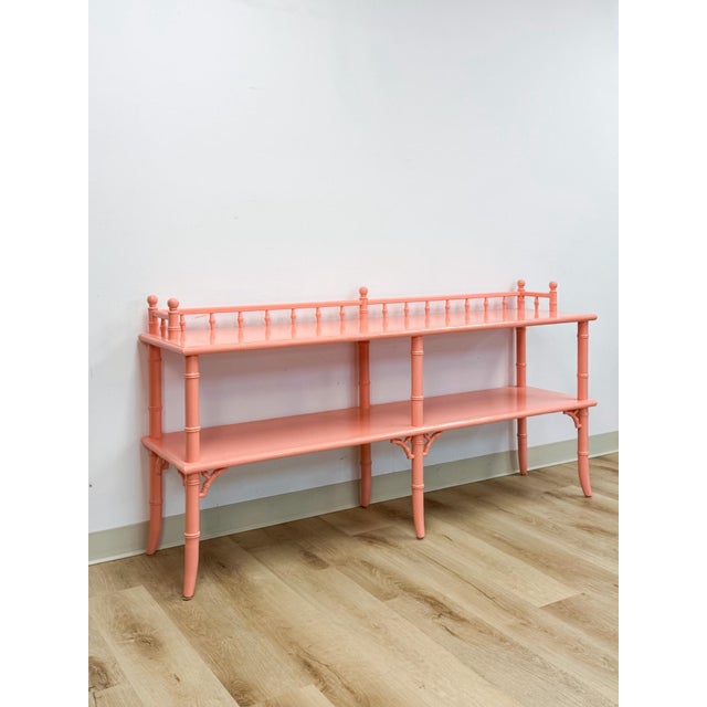 This stunning vintage Thomasville Allegro style pink faux bamboo console table is one of the most coveted and collectible...