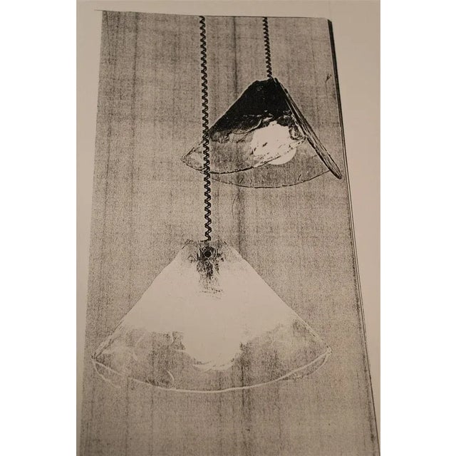 This vintage ceiling lamp was designed by Carlo Nason and manufactured for Mazzega Italy during 1970. The ceiling lamp is...