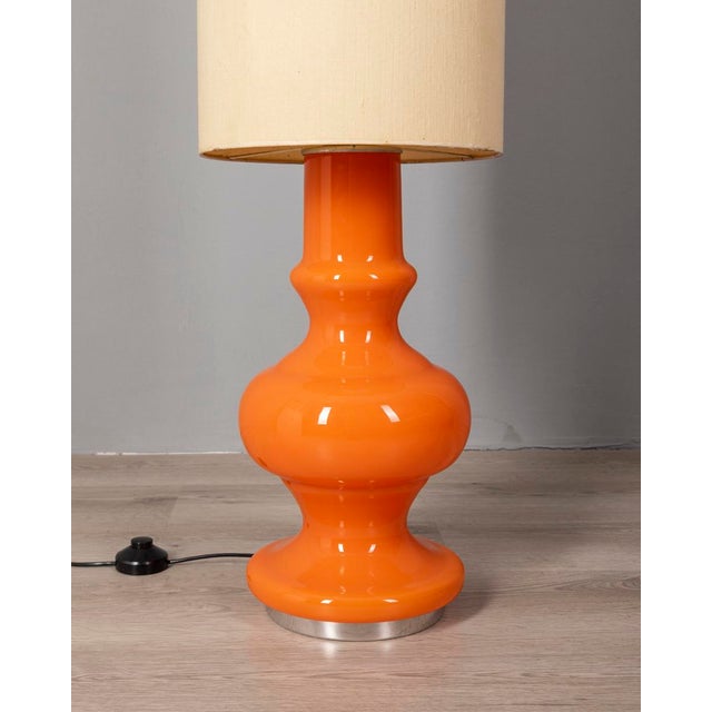 Floor lamp with orange glass body and fabric lampshade, Italian design, 1970s. European Plug (up to 250V).The wiring of...