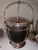 This is a early 1900 silver plated ice bucket it does require some TLC as it is tarnished and does have some dings.