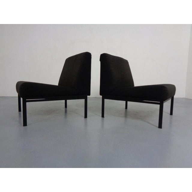 Armchair with original upholstery and covers by Rolf Grunow for Walter Knoll from the 1960s. The second armchair has...