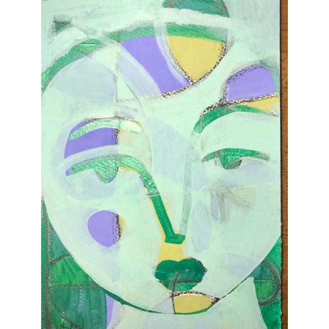A face in celadon and purple. An original one of a kind painting by Auker. Primarily matte finish with green metallic...