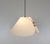 Melilla pendant, designed by Vico Magistretti in 1978 and manufactured by Oluce. The model consists of two plastic parts...