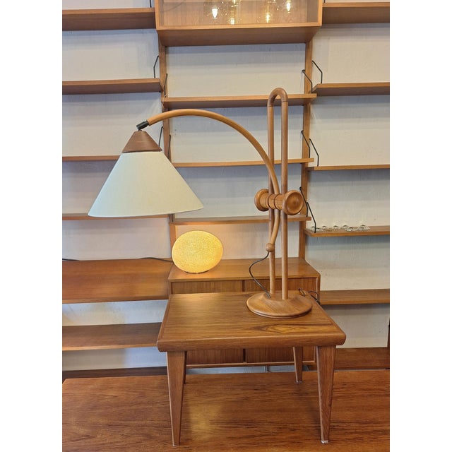 Domus large multi-adjustable table or reading lamp in teak, Denmark 1970s. The lamp is large enough to also be used as a...