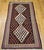 A beautiful vintage Persian Senneh kilim from the Kurdish region of Western Persia, this finely hand woven flat-weave rug...