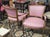 A beautiful pair of hot pink 1950s Napoleonic French armchairs. Each chair features satin like cotton hot pink upholstery...