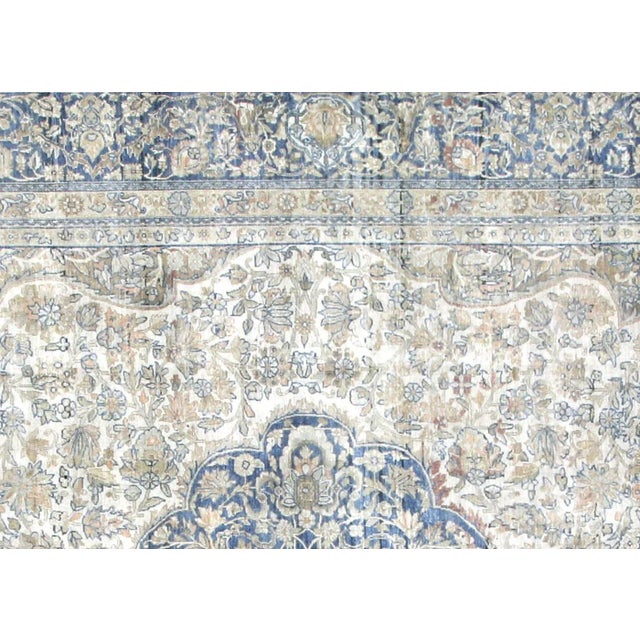 1940s Persian Kerman Carpet. Hand woven in the Kerman region of Iran. Distressed and refinished in the U.S. The Persian...