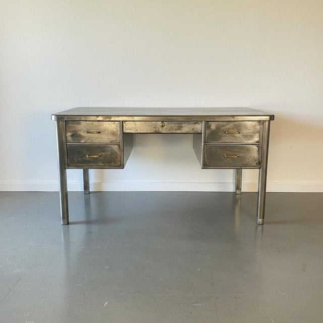 Vintage polished double pedestal steel desk Lovely polished double pedestal steel desk. In good vintage condition - this...