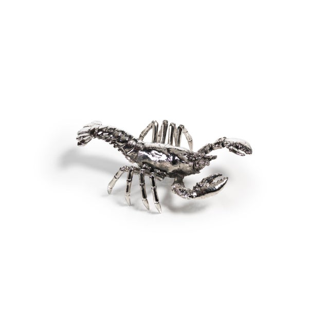This exquisite Prawn Figurine brings the beauty of the ocean's unique creatures to your table setting. Constructed in...