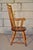 Here's a great looking and comfortable Windsor style chair my family purchased in the early 1970s. It came from a dealer...