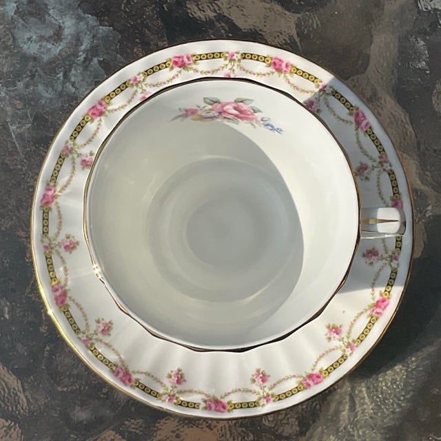 Duchess Teacup and Saucer made in England circa 1990’s. Lovely design with a lot of detailed design. Very pretty!