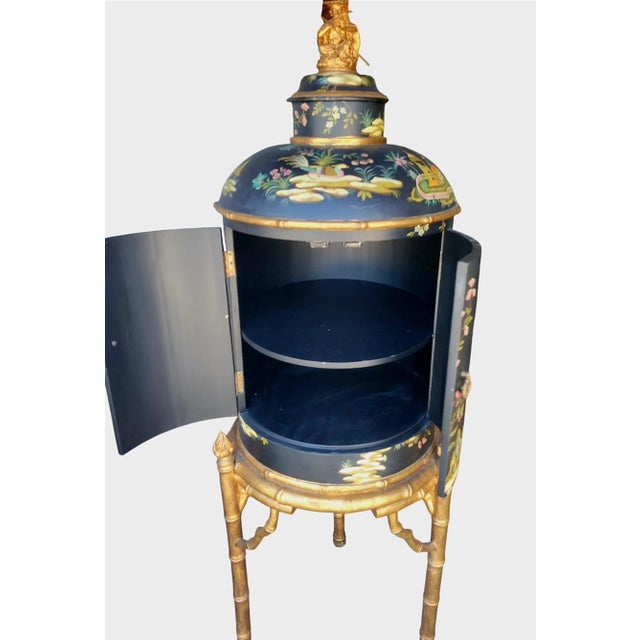 ​Make a dramatic, maximalist statement with this vintage monumental pair of Chinoiserie tea caddy-style cabinets on faux...