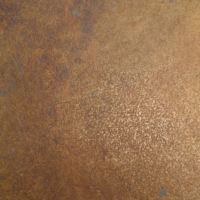 Modern round brass finish cast aluminum dining table with pedestal base. Wonderful metallic warm touch for an industrial...