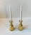 A pair of solid brass candlesticks designed and manufactured by by Boyes in Denmark during the 1960s-70s. The candlesticks...