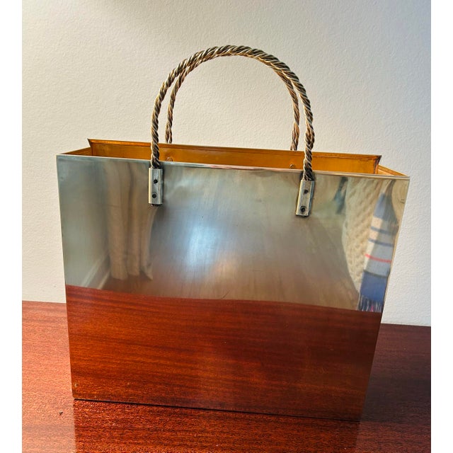 1970's shopping bag sculpture or magazine holder with braided brass handles. 15" to top of handles, width is 13", 11" to...