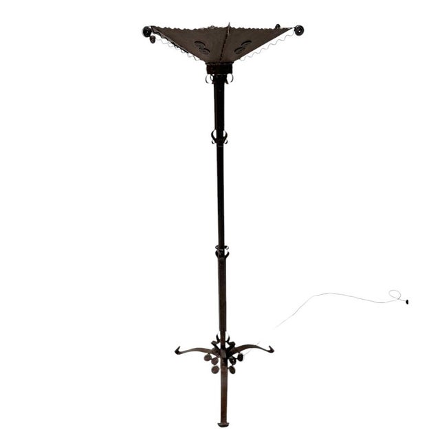 Magnificent and rare Art Deco floor lamp.Striking French design from the 1930s.Patinated wrought iron base with original...