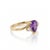 Exude royal elegance with this beautifully tailored pear-cut amethyst bypass ring. Showcasing a deep, velvet-purple...