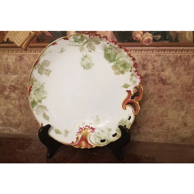 This auction plate was produced by Haviland Limoges in France and distributed by T.M. James & Sons. Co. That is what you...