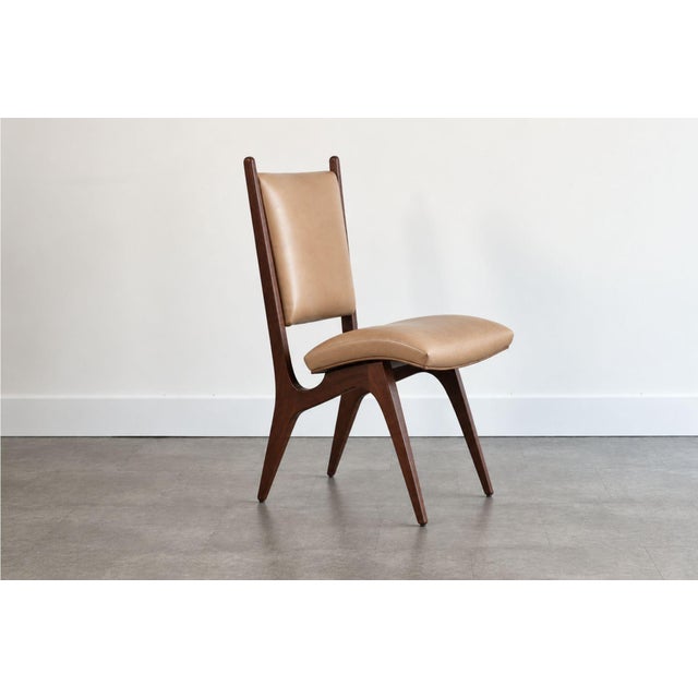 A striking set of six Vladimir Kagan Sculpted Sling Dining Side Chairs, Model VK 101, an iconic design originally...