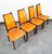 Set of eight Orange tweed and walnut dining room chairs w/ 2 matching captain chairs. American design. Unknown maker....