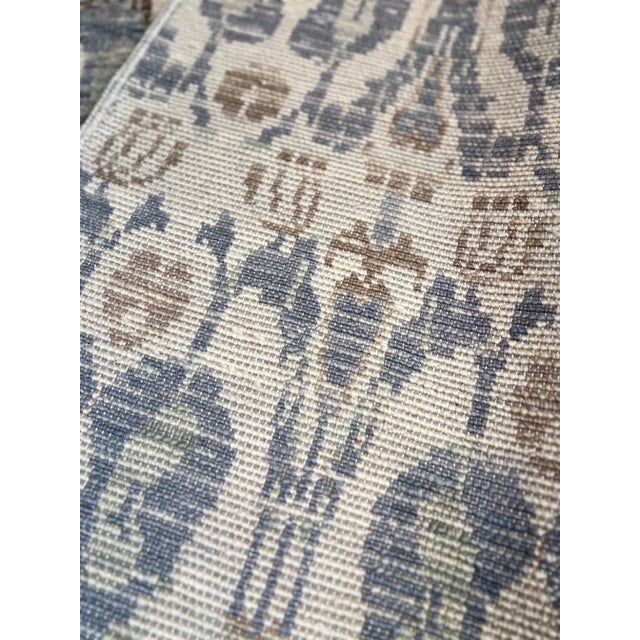 Hand knotted rug in hard to find arts and crafts design and soft colors