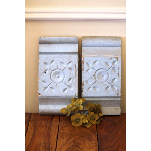 This is an excellent pair of identical plinth blocks with a carved center rosette and rolled edges. The edges are...