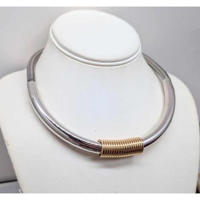 1970s rhodium plated tube front section with goldtone wrapped wire center with snake chain in the back necklace with hook...
