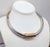 1970s rhodium plated tube front section with goldtone wrapped wire center with snake chain in the back necklace with hook...