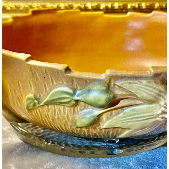 This Vintage 1940s Roseville Pottery Clematis Console Bowl 457-8 in Autumn Brown is a decorative and handmade piece of...