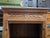 Bring global warmth and artisanal character to your space with this striking vintage solid wood bookcase. Featuring a...