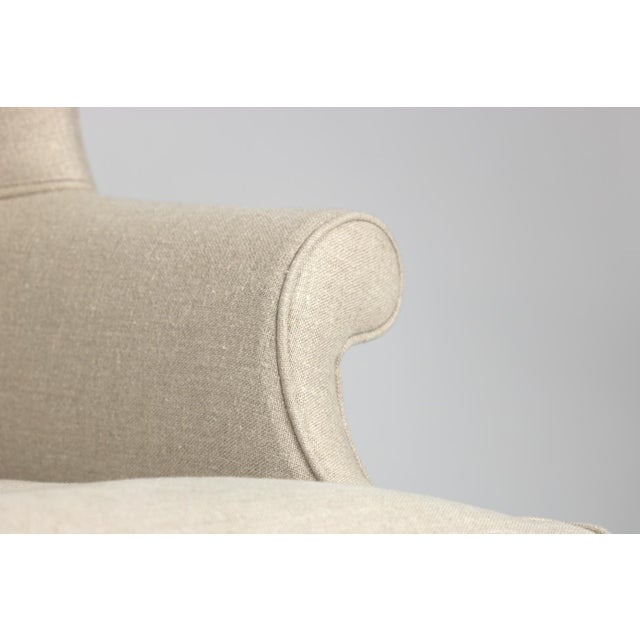 A Handsome Mahogany frame upholstered wing chair with rams head carved legs, English, circa 1880. on Queen Anne legs and...