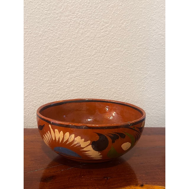 Beautiful rough and rustic hand-painted Terracotta bowl. Opening 9” wide by 4” high